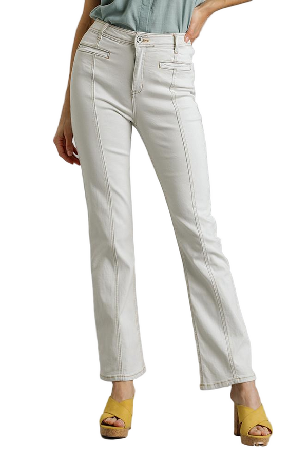 Light-colored pants worn by a person on a white background