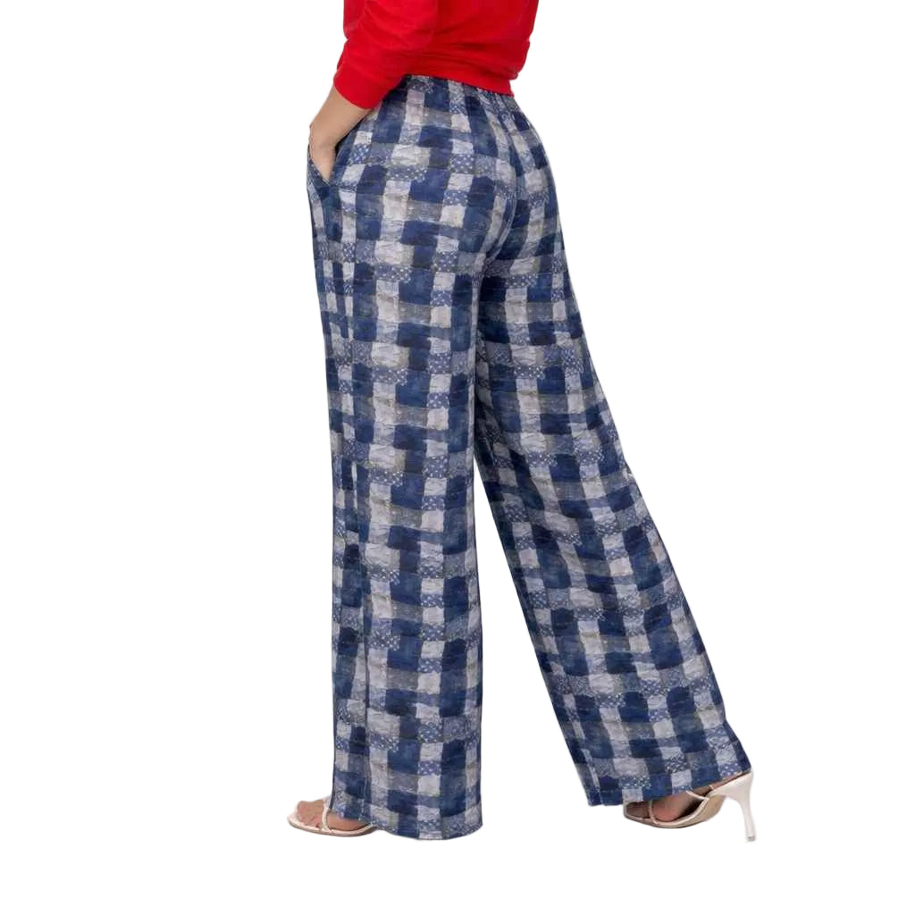 Blue and white checkered pants worn by a person on a white background